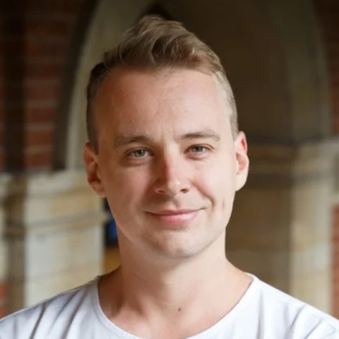 Portrait of Dr Adam Hunt